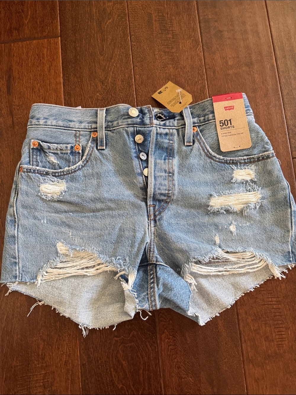 Levi's Distressed Denim Cutoff Shorts in Light Blue